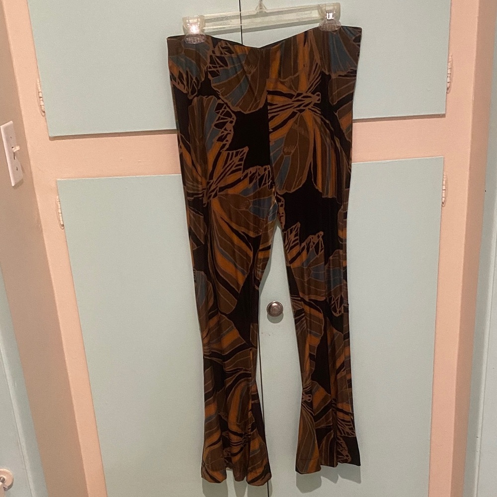 Free People Black Floral Print Flared Pants with Brown and Teal Accents